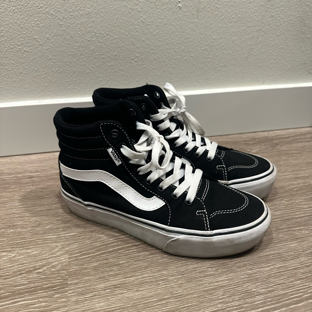Vans black high top sneakers